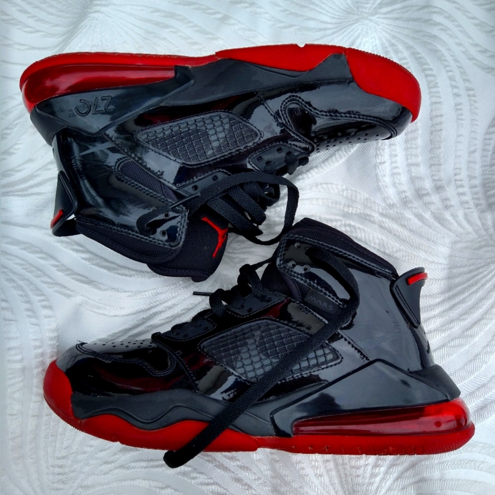 Jordan son of Mars, red and black, size 5.5y